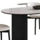 Close-up of Orbis Dining Table with Matte Cream Top and Black Base