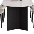 Base detail of Orbis Dining Table with curved black support and rounded top