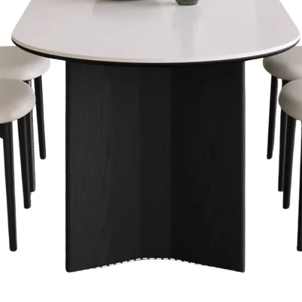 Orbis Dining Set 4 Base detail of Orbis Dining Table with curved black support and rounded top