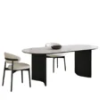 Orbis Dining Table with black curved legs and cream chairs