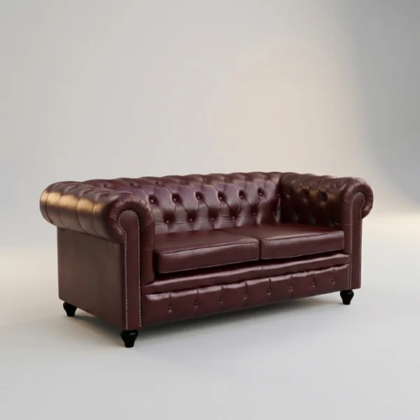 Cherry Red Chesterfield Leather Sofa - 2 seater tufted cherry red chesterfield in studio image