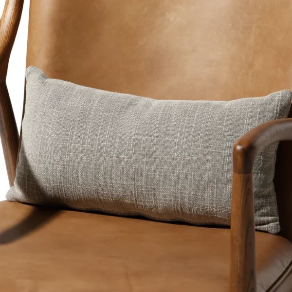 Incurve Leatherite Chair – Brown leatherite seat with a textured cushion and wooden frame Incurve Leatherite Chair – Brown leatherite seat with a textured cushion and wooden frame