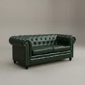 angled view of 2 seater Jade Green Chesterfield Leather Sofa in studio backgrpound