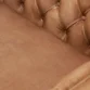 Close-up of brown Lavender Pure Leather Sofa with tufted backrest and smooth seat cushion.