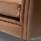 Close-up of brown Lavender Pure Leather Sofa corner with soft cushions and detailed stitching