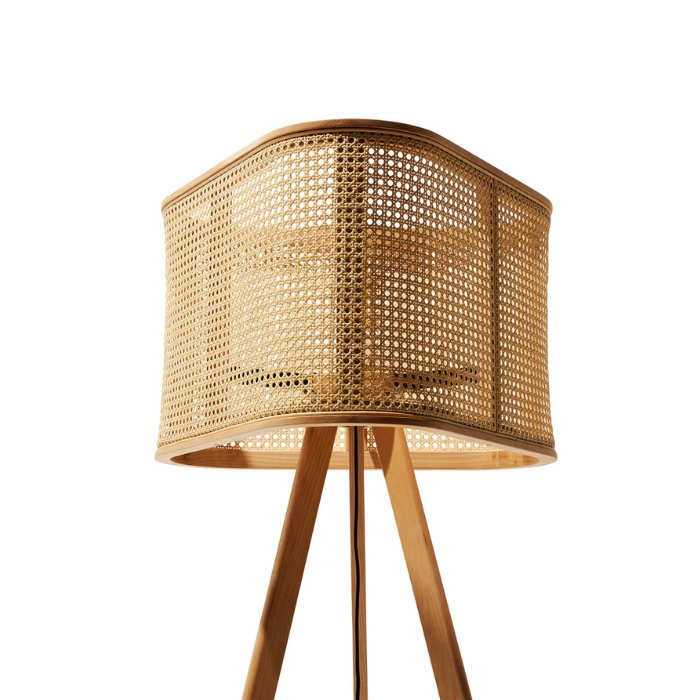 Elegant wooden tripod floor lamp with a woven rattan shade, perfect for adding warmth to any room.