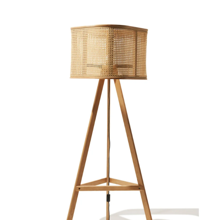 Elegant wooden tripod floor lamp with a woven rattan shade, perfect for adding warmth to any room.