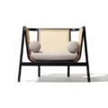 Harvey Cane Chair Front View with Pillows on chair