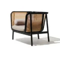 Harvey Cane Chair Side View with Pillows on chair