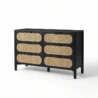 Angled view of black dresser in white backgound