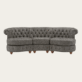 Noble Curved Sofa in a plush velvet finish with tufted scroll arms, curved frame, and supportive cushions, perfect for premium living spaces in Pakistan.