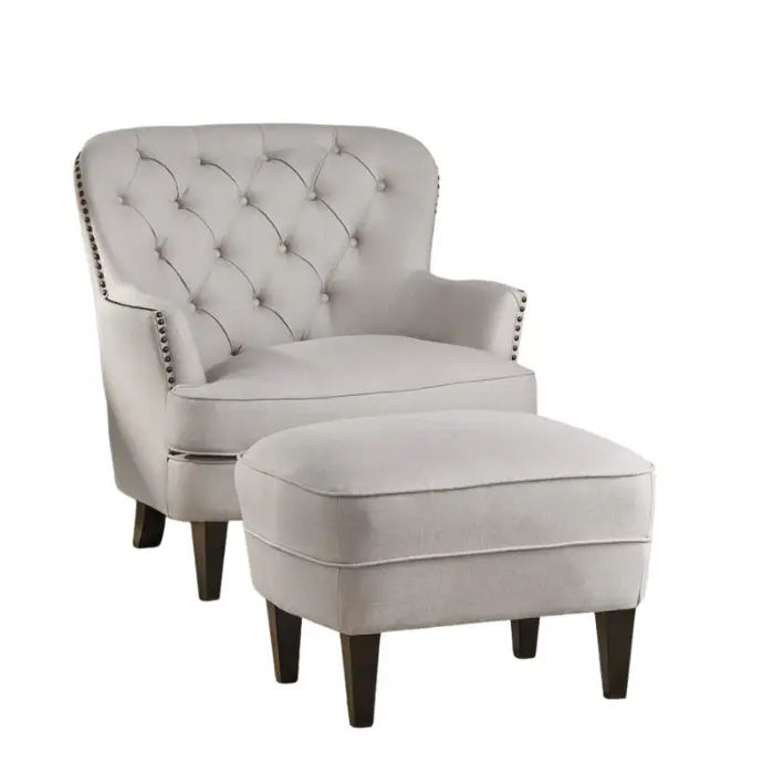 Windsor Club Chair with Ottoman featuring button-tufted design, nailhead trim, and plush fabric upholstery in Pakistan and UAE.