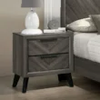 wooden side table in a bedroom.
