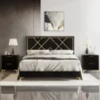 front view of black upholstered bed in a modern living room