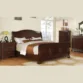 brown wooden bed in a modern bedroom