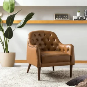 Aurum-Chair-2 Stylish brown leather armchair with tufted design, perfect for modern home decor.