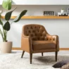 Stylish brown leather armchair with tufted design, perfect for modern home decor.