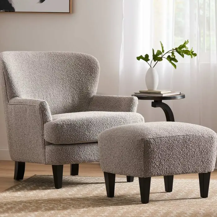 Cloudhaven Boucle Chair with Ottoman featuring soft boucle upholstery and birch wood legs, perfect for modern living spaces in Pakistan and UAE.