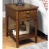 Elegant Shelbourne Side Table with reverse pattern top, kiln-dried ash wood veneer in aged sienna brown, featuring storage and brushed nickel knobs, perfect for modern homes in Pakistan and UAE.