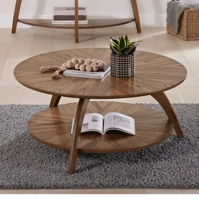 Solaris round coffee table with starburst design in nutmeg brown finish, featuring a lower storage shelf, perfect for modern and premium living spaces.