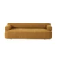 Front view of modern ochre sofa with cylindrical armrests and low, streamlined seat.