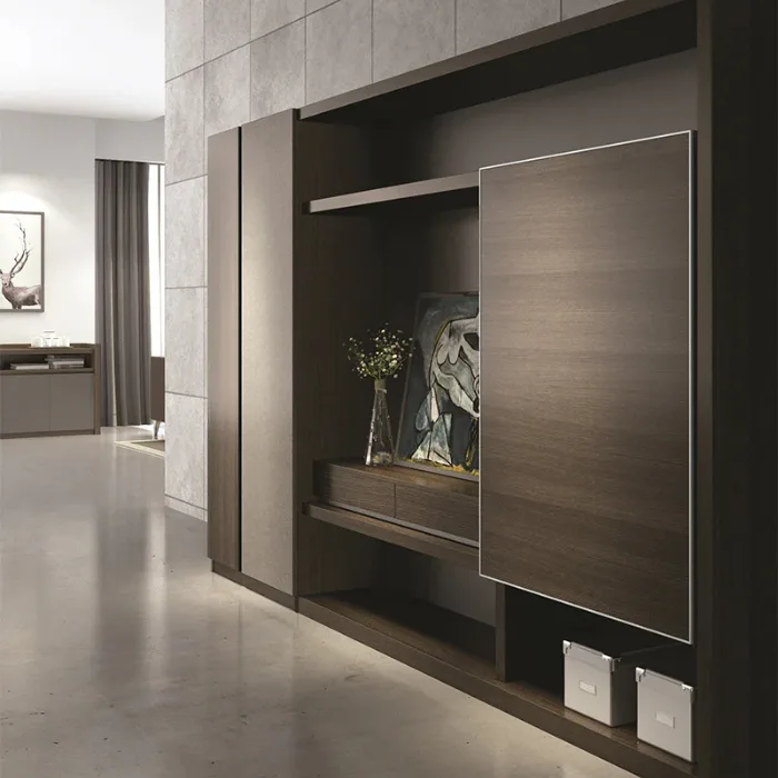 Contemporary brown wall shelving unit with framed art, books, and a right-side sliding door.