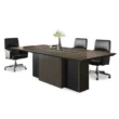 Carter Boardroom Table with wide rectangular top, pedestal base, central cable channel, black chairs.
