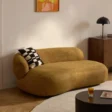 angled view of halo curve sofa in a modern living room.
