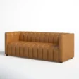 Right-angle view showing deep seat cushions, low block legs, and clean lines.