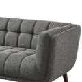 Ardrie Upholstered Sofa armrest close-up — side view of dark grey fabric texture.