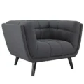 Bestow Upholstered Armchair side angle showcasing tufted design and smooth upholstery