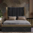 Cosmo Bed with black channel-tufted headboard, gold geometric accents, and platform base