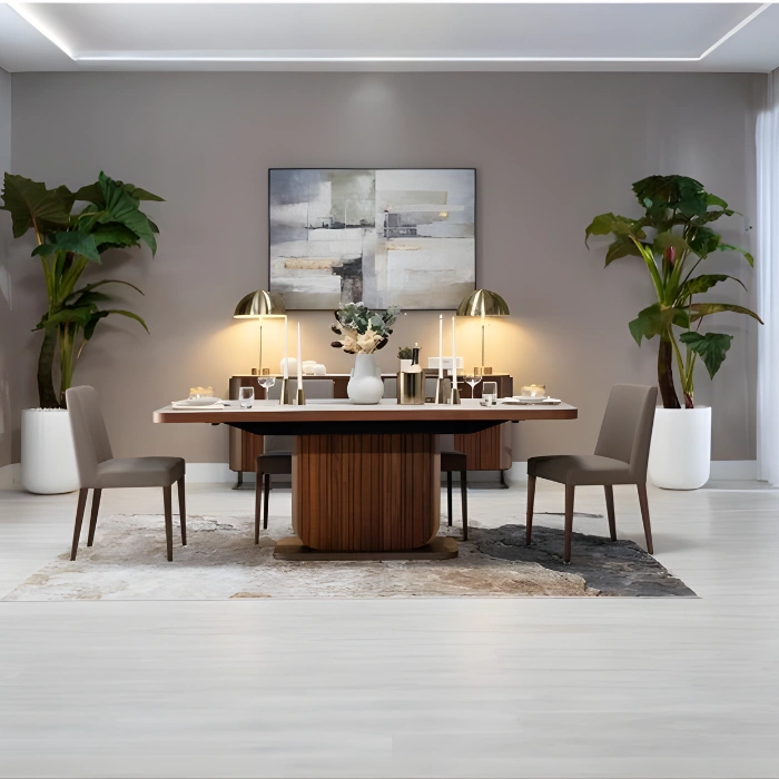 Dining Set in marble-look rectangular table with fluted walnut pedestal and taupe upholstered chairs styled in a modern dining room.
