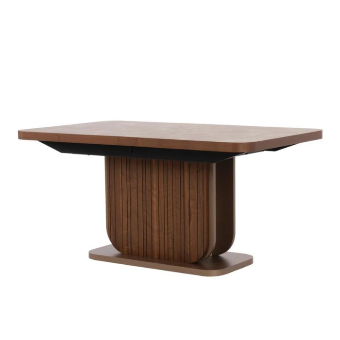 Three-quarter angle of the table highlighting rounded edges and sculptural pedestal.