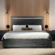 Eclipse Bed - Modern dark wood bed with a sleek headboard, complemented by soft bedding and minimalist wall-mounted lamps.