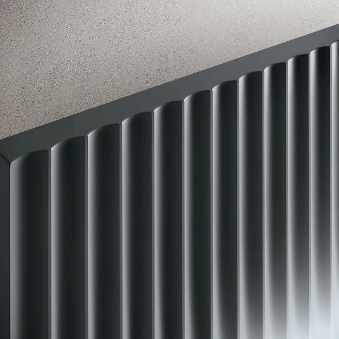 Detail of ribbed panel design on upper headboard.