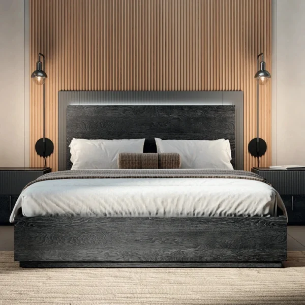 Eclipse Bed Eclipse Bed - Modern dark wood bed with a sleek headboard, complemented by soft bedding and minimalist wall-mounted lamps.