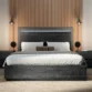 Eclipse Bed - Modern dark wood bed with a sleek headboard, complemented by soft bedding and minimalist wall-mounted lamps.