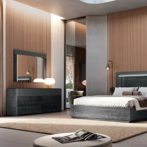 Modern bedroom interior featuring dark wood dresser, bed, and mirror with warm ambient lighting.
