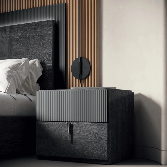 Side table beside bed showing cohesive bedroom setup.