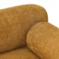 Detailed view of soft ochre upholstery showing plush texture and rounded backrest.