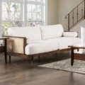 Larsen Sofa 3-seater in light beige upholstery with wooden frame and cane side panels
