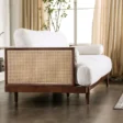 Rear-side angle of Sofa highlighting rattan cane panel.