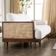 Rear-side angle of Sofa highlighting rattan cane panel.