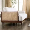 Rear-side angle of Sofa highlighting rattan cane panel.