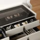 Top view of black glass surface with organized compartments.