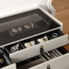 Top view of black glass surface with organized compartments.