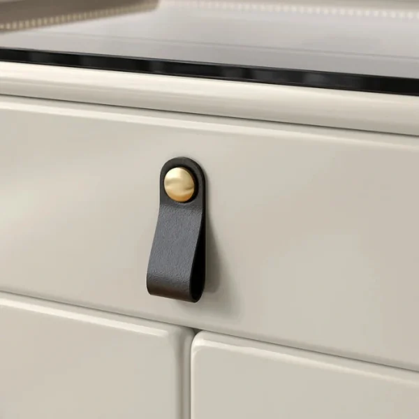 Linea Dresser - Off white (8) Close-up of leather handle and gold accent.