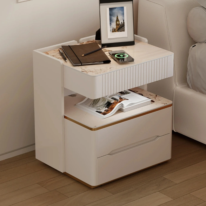 Modern off-white side table with marble top, ribbed detailing, and gold trim for a refined touch.