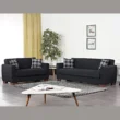 Marlo Living Room Set in black 3-seater and 2-seater sofas with plaid cushions, wood legs, coffee table and rug in a bright living room.